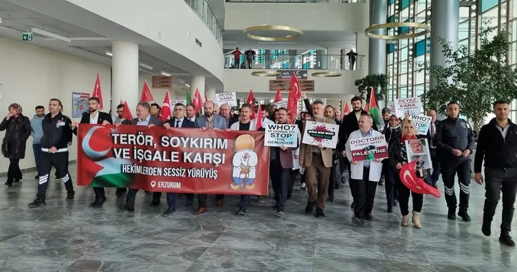 Erzurum’da hekimler, İsrail’in saldırılarını protesto etmek için şehir hastanesi içinde sessiz yürüyüş yaptı