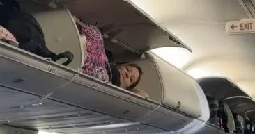 Uçaktaki görüntüler şoke etti! Kabin bagajına valizini değil kendini koydu...