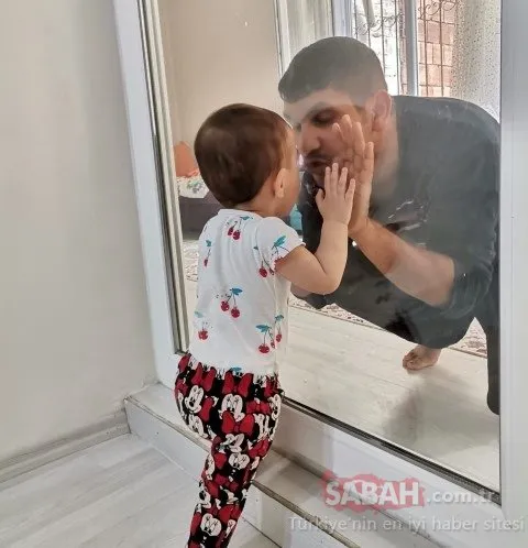 Yürek sızlatan görüntü! 2 yaşındaki kızını camın arkasından seviyor