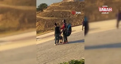 Köpeğiyle yamaç paraşütü atlayışı yaptı, o anlar kamerada