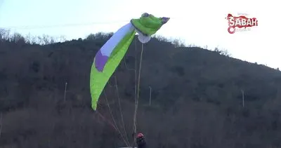 Elektrik tellerinde mahsur kalan yamaç paraşütçüsü kamerada | Video