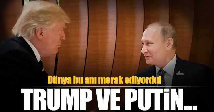 Putin ve Trump el sıkıştı