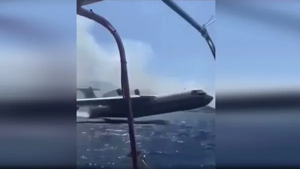 Marmaris'te yattaki tatilciler yangın söndürme uçağından rahatsız olup böyle tepki gösterdiler 