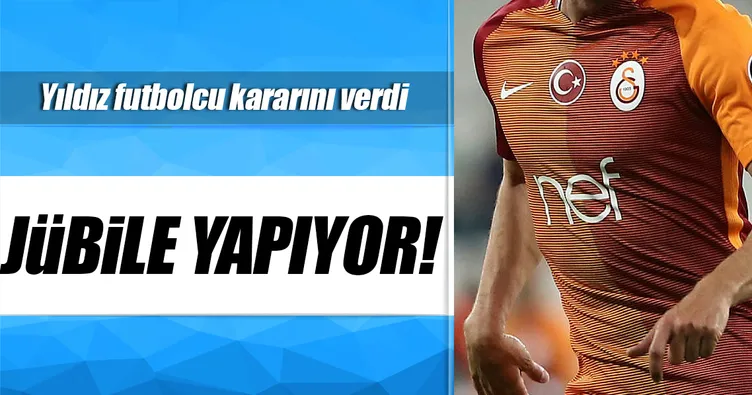 Kramponlarını asıyor