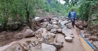 Yusufeli'de sağanak yağışla dereleri taştı, köprü ve yollar sel suları altında kaldı #artvin
