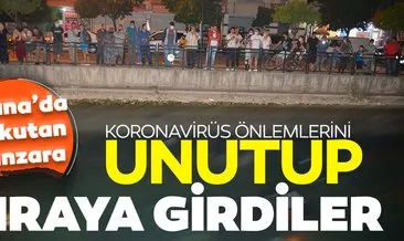 Adana’da koronavirüs tedbirleri unutuldu! Vatandaşlar kanala uçan otomobili görmek için sıraya girdi